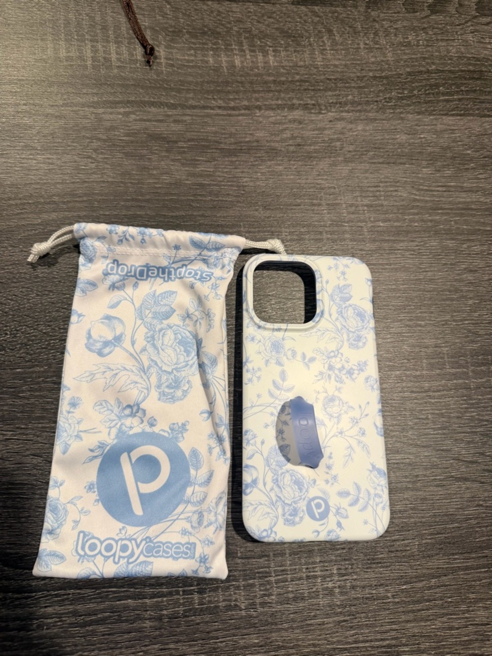 Like New Loopy Case White and Light Blue Floral iphone 15 pro max